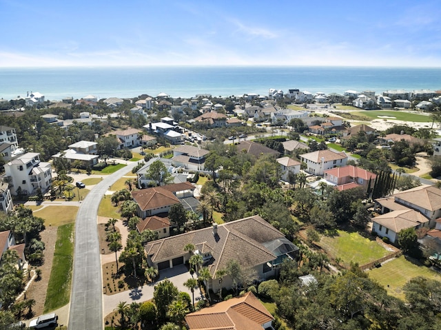 bird's eye view with a residential view and a water view