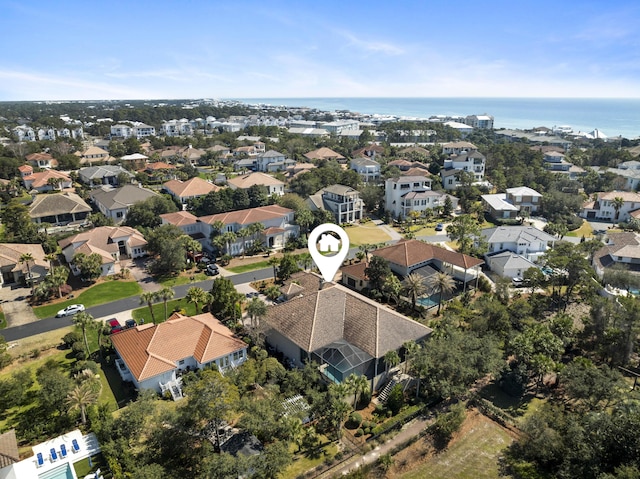 bird's eye view featuring a water view and a residential view