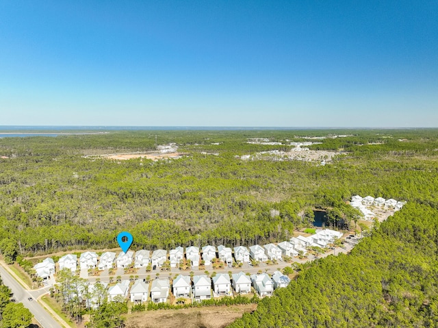 birds eye view of property with a residential view