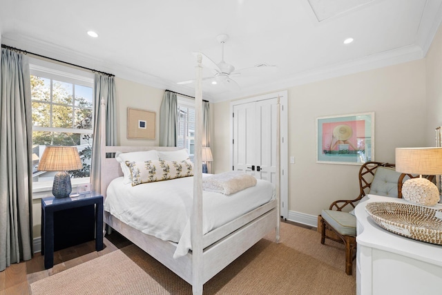 bedroom featuring ornamental molding, multiple windows, recessed lighting, and baseboards