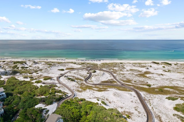 bird's eye view featuring a beach view and a water view