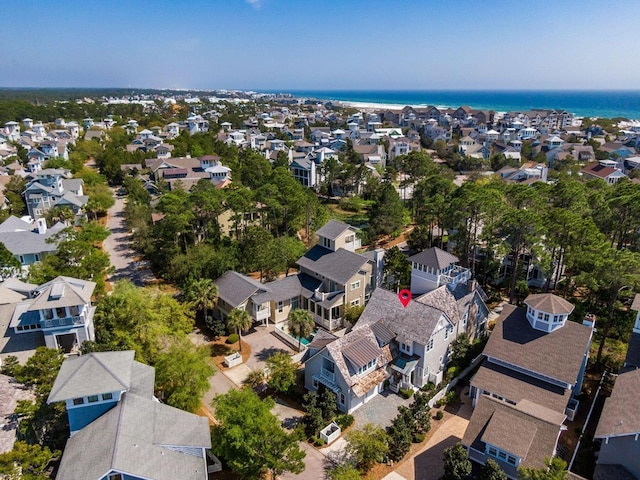bird's eye view with a water view and a residential view