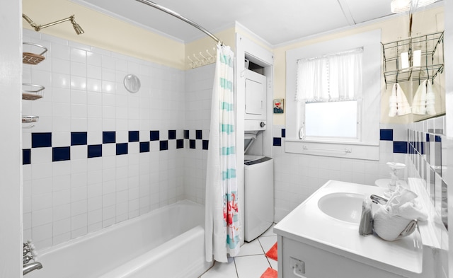 full bath featuring vanity, tile walls, tile patterned floors, shower / bath combination with curtain, and crown molding