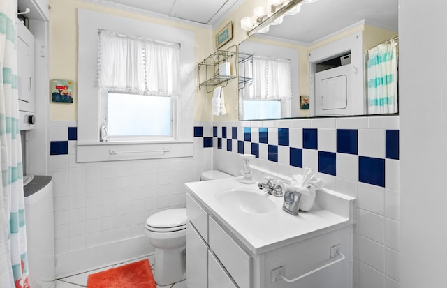 full bathroom featuring toilet, a wealth of natural light, and tile walls