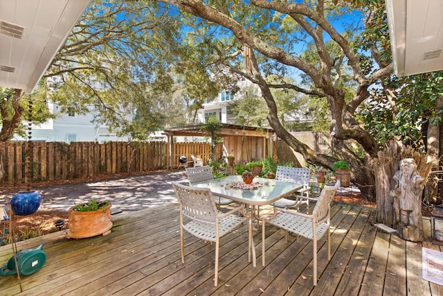 deck with fence private yard and outdoor dining area