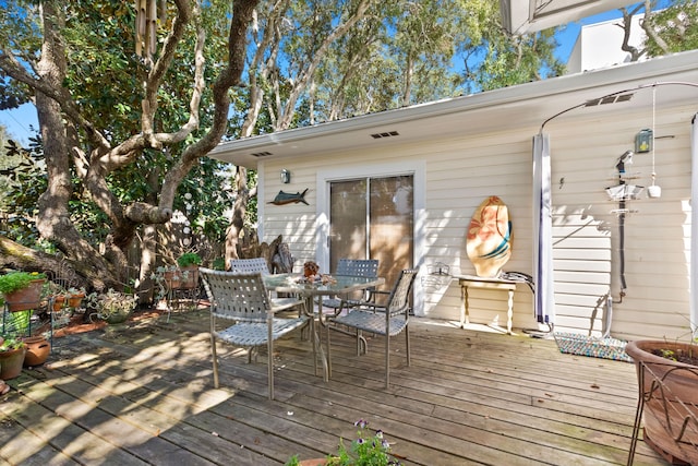 deck featuring outdoor dining space