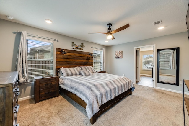 bedroom with visible vents, light carpet, a ceiling fan, recessed lighting, and baseboards