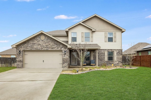 traditional-style house with brick siding, an attached garage, a front lawn, and fence