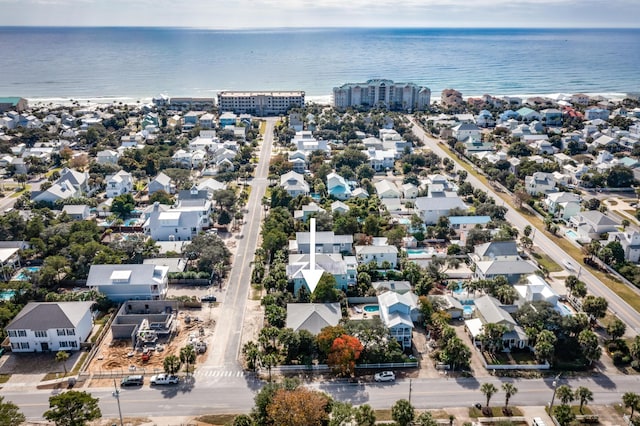 aerial view featuring a residential view and a water view