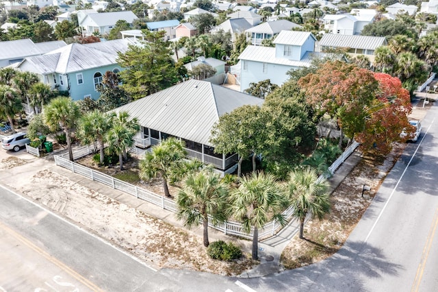 birds eye view of property with a residential view