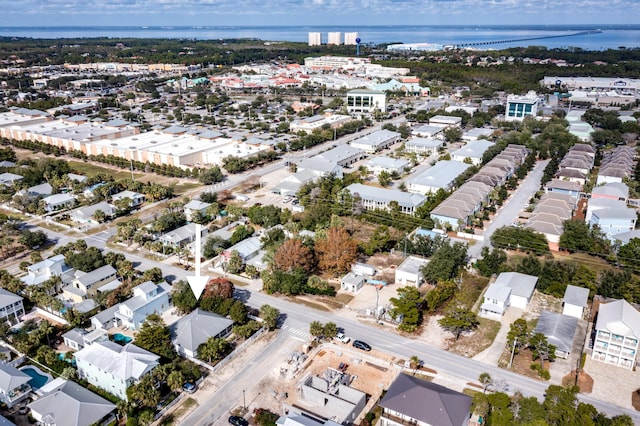 birds eye view of property with a residential view and a water view