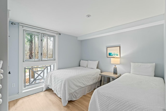 bedroom with light wood-style floors