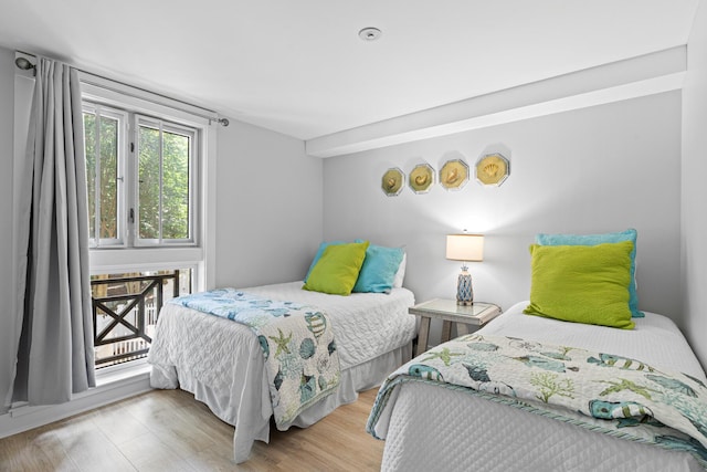 9100 Baytowne Wharf Blvd Unit 451, Miramar Beach, FL 32550 - bedroom featuring wood finished floors