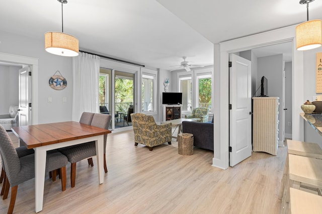 9100 Baytowne Wharf Blvd Unit 451, Miramar Beach, FL 32550 - dining space with ceiling fan and light wood-type flooring