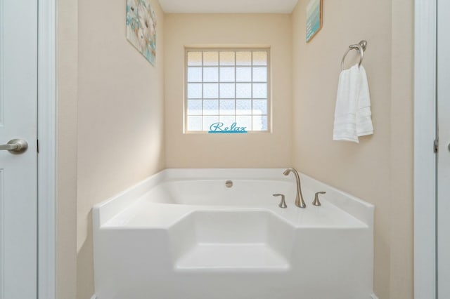 full bathroom with a garden tub
