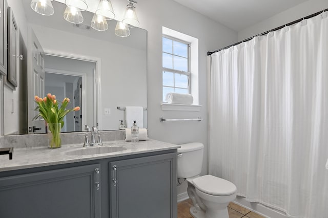 bathroom featuring tile patterned flooring, toilet, vanity, visible vents, and a shower with curtain