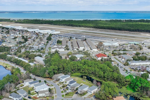 bird's eye view with a water view and a residential view