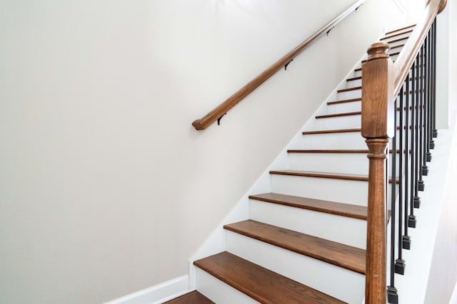 staircase with baseboards