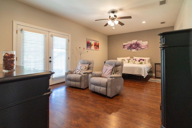 bedroom with access to exterior, ceiling fan, visible vents, and dark wood finished floors