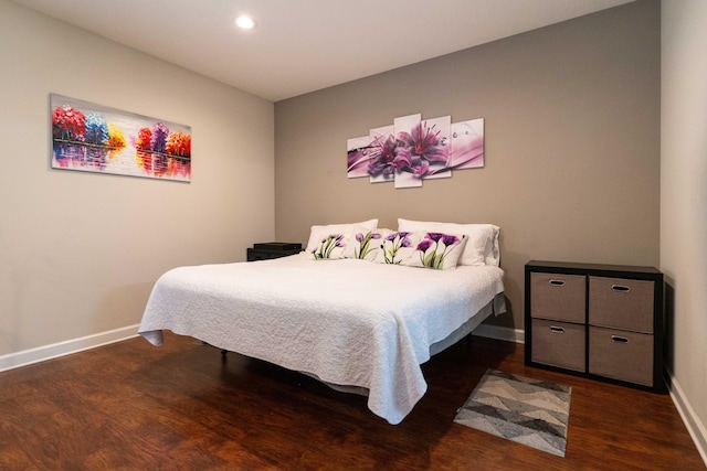 bedroom featuring recessed lighting, wood finished floors, and baseboards