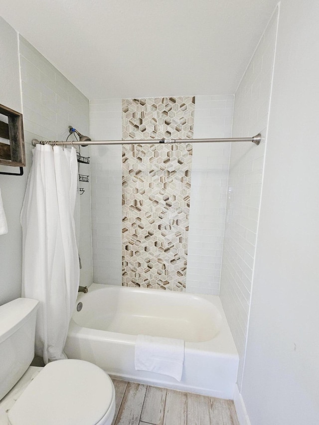 full bathroom with toilet, shower / bath combo, and wood finished floors