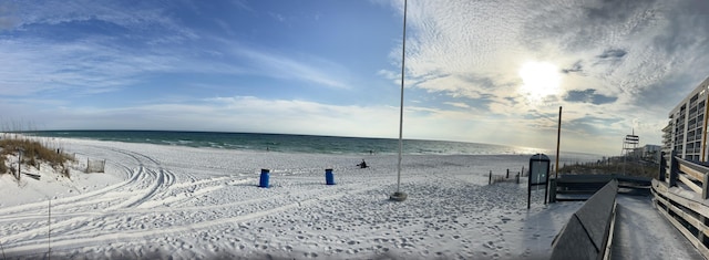 view of water feature with a beach view