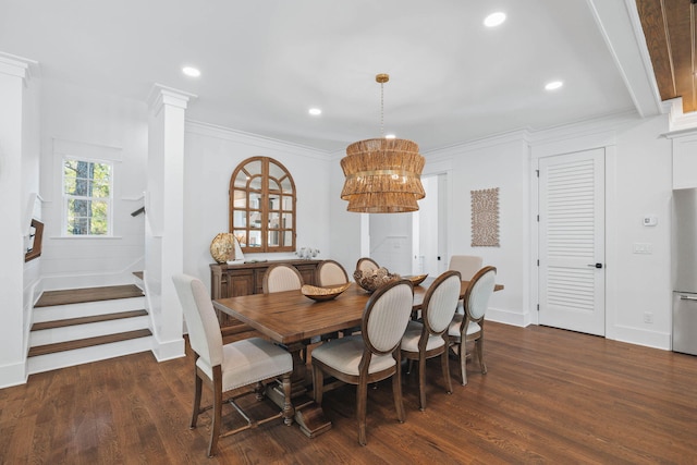 dining room featuring recessed lighting, wood finished floors, baseboards, stairway, and crown molding