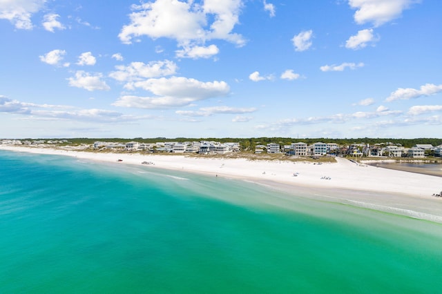 aerial view featuring a water view and a beach view