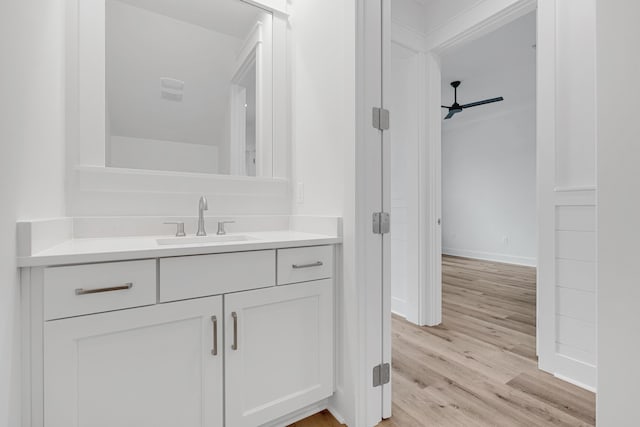 307 W Firethorn Cir Lot 42, Inlet Beach, FL 32461 - bathroom featuring baseboards, wood finished floors, and vanity