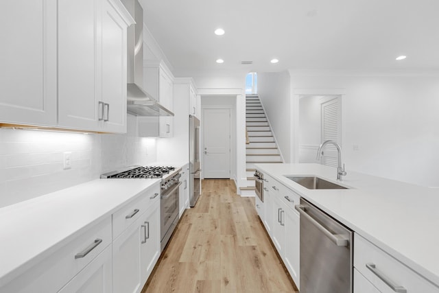 307 W Firethorn Cir Lot 42, Inlet Beach, FL 32461 - kitchen with high end appliances, light countertops, a sink, wall chimney exhaust hood, and white cabinets