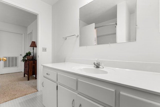 bathroom featuring vanity, visible vents, and a shower with curtain