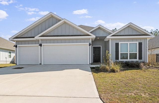 single story home with a garage, board and batten siding, driveway, and a front lawn