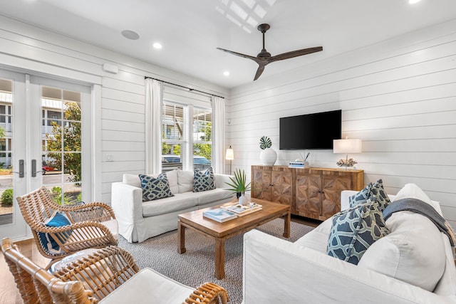 living room featuring a ceiling fan and recessed lighting