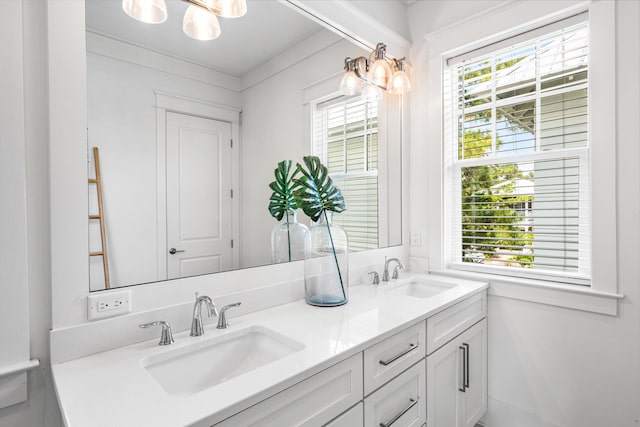 bathroom featuring double vanity and a sink