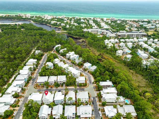 aerial view featuring a water view and a residential view