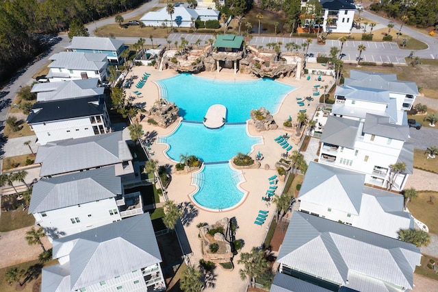 birds eye view of property with a residential view