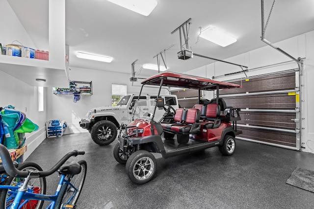 garage featuring a garage door opener