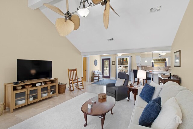 8840 Sand Pine Dr, Navarre, FL 32566 - living area featuring light tile patterned floors, high vaulted ceiling, visible vents, and a ceiling fan