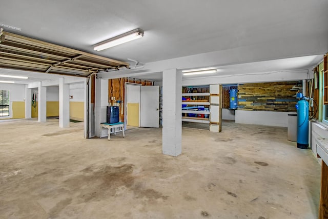 8840 Sand Pine Dr, Navarre, FL 32566 - unfinished basement featuring freestanding refrigerator