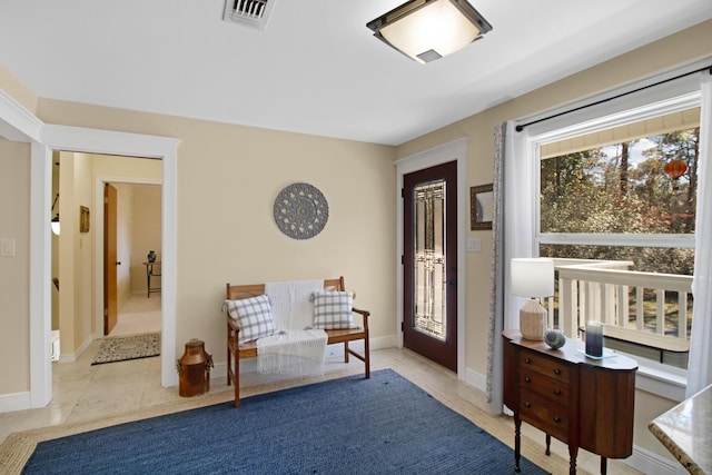 8840 Sand Pine Dr, Navarre, FL 32566 - living area with baseboards, visible vents, and tile patterned floors