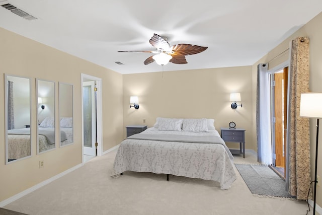 8840 Sand Pine Dr, Navarre, FL 32566 - carpeted bedroom with baseboards, visible vents, and a ceiling fan