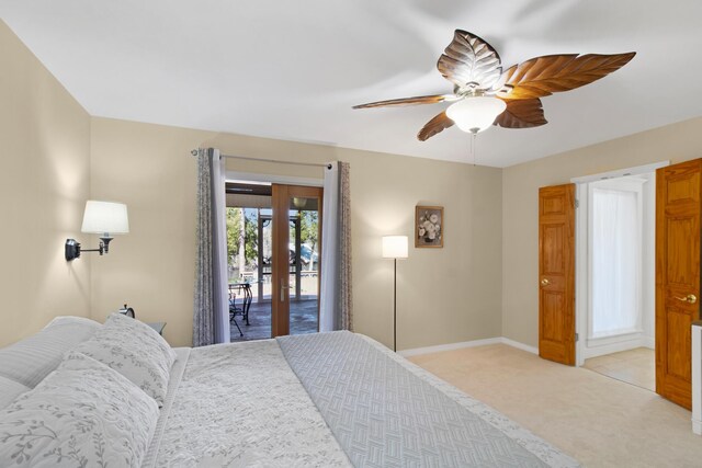 8840 Sand Pine Dr, Navarre, FL 32566 - bedroom with light colored carpet, a ceiling fan, baseboards, access to exterior, and french doors