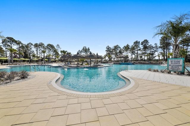 pool with a patio