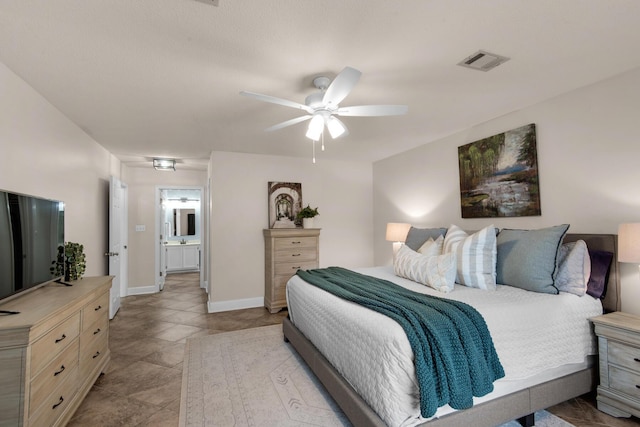 bedroom with baseboards, visible vents, and a ceiling fan