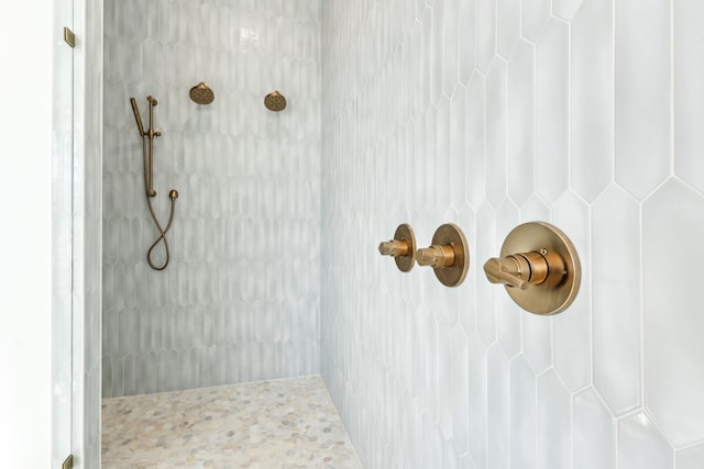 full bathroom with tiled shower