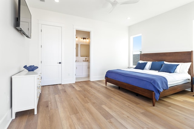 bedroom featuring light wood-style floors, recessed lighting, and baseboards