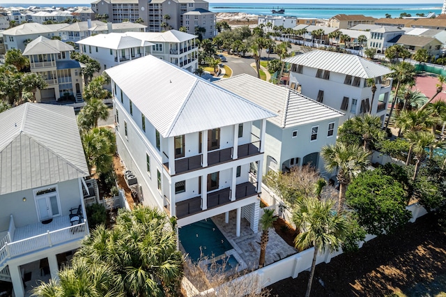 aerial view with a water view and a residential view