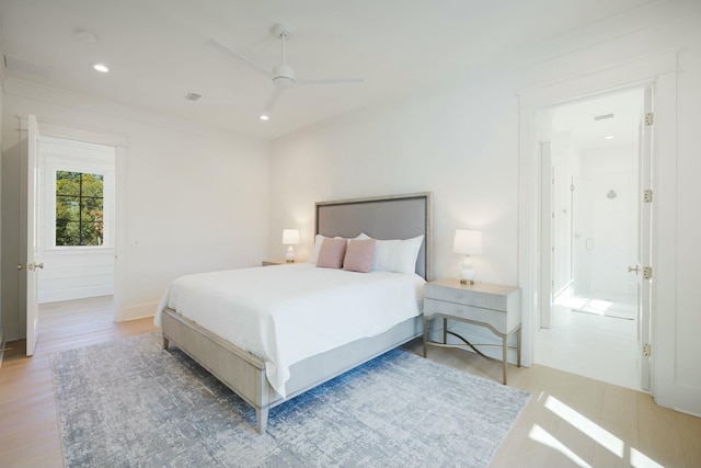 bedroom featuring light wood finished floors, ceiling fan, visible vents, and recessed lighting