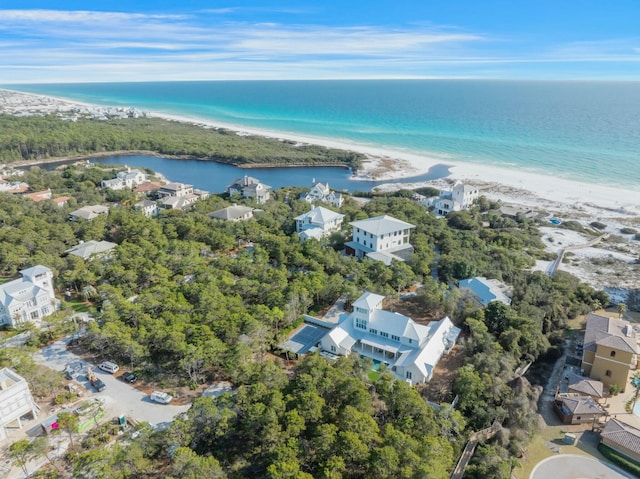 aerial view with a water view and a view of the beach