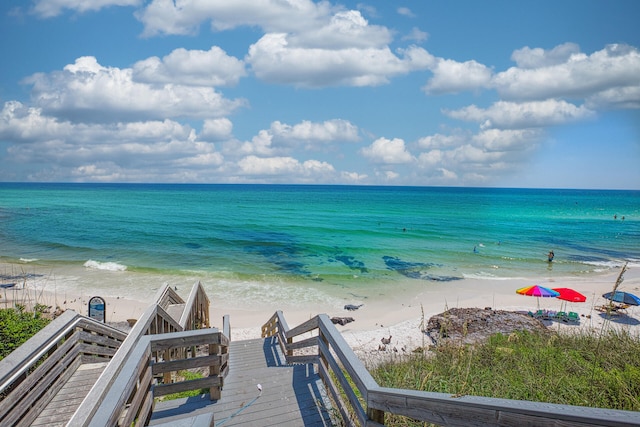 view of water feature with a beach view